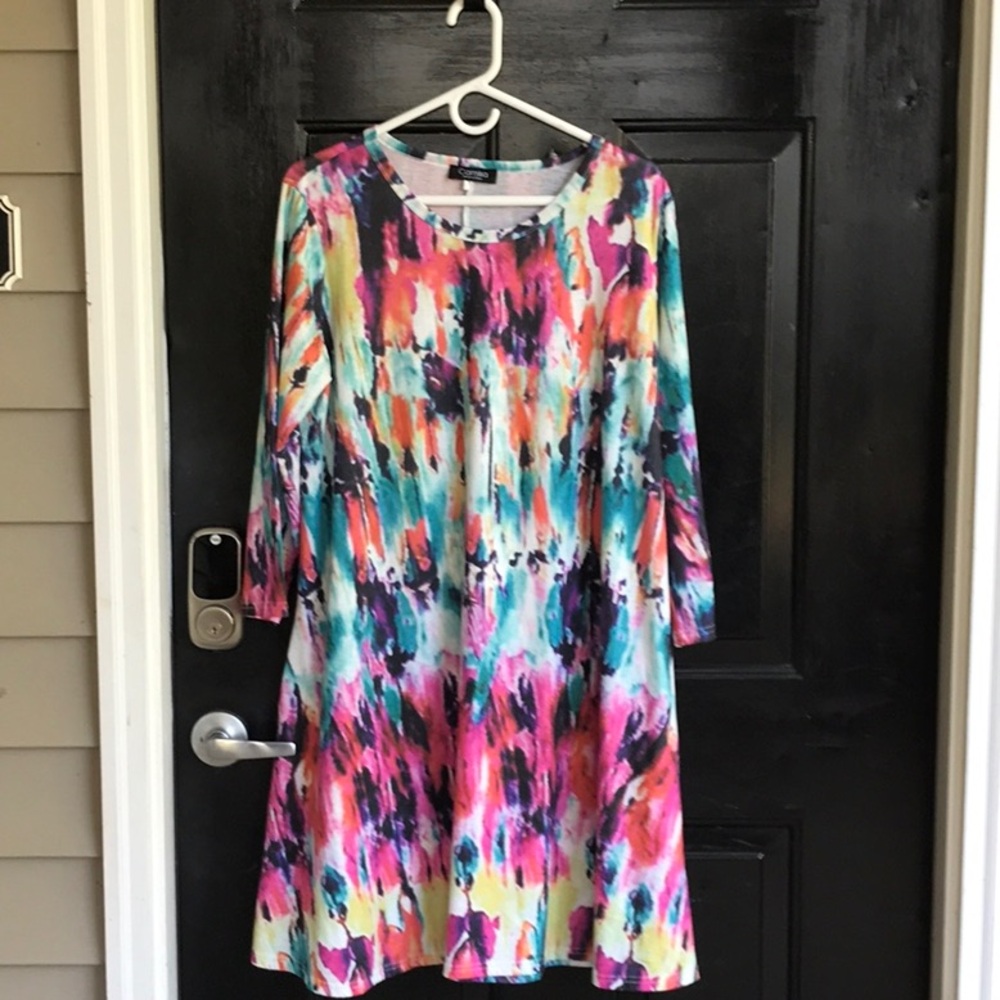Splashes of bold color make this great little dress from Camisa a winner!